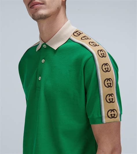 gucci polo with interlocking g stripe